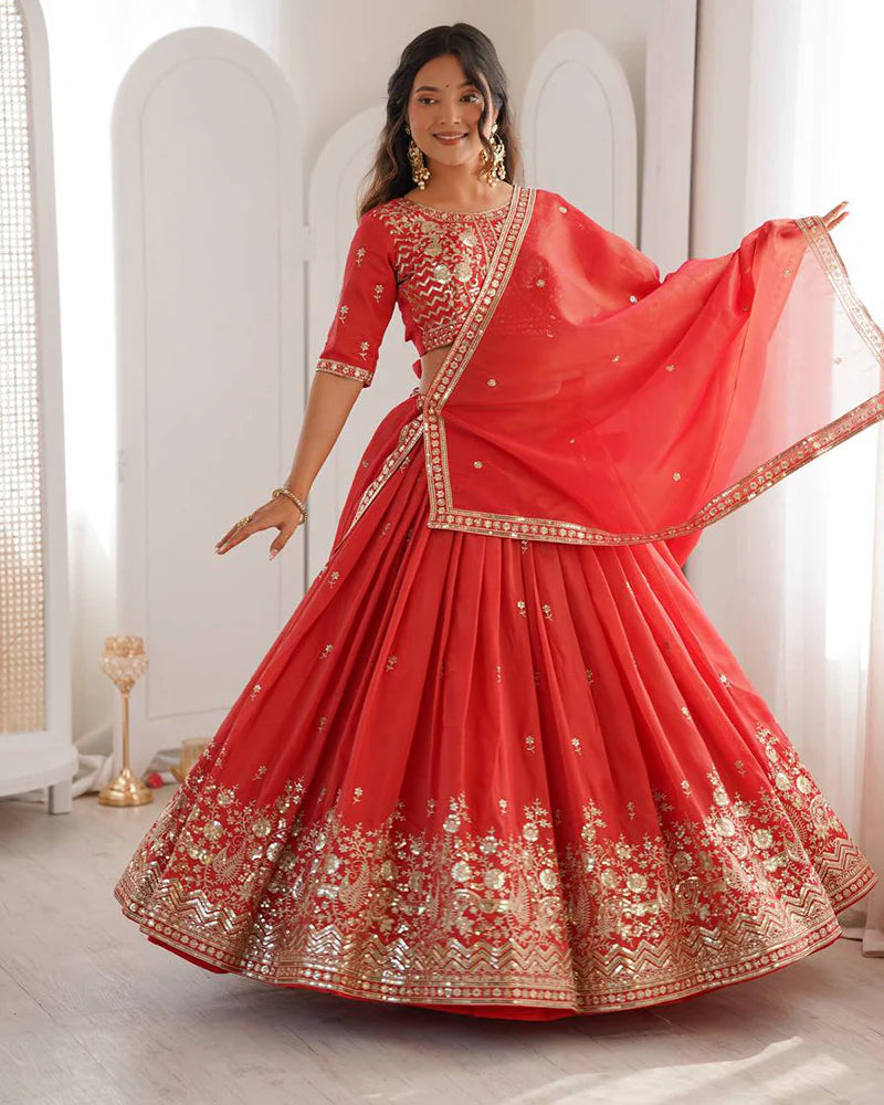 Womenline Orange Color Shimmer Silk Lehenga Choli