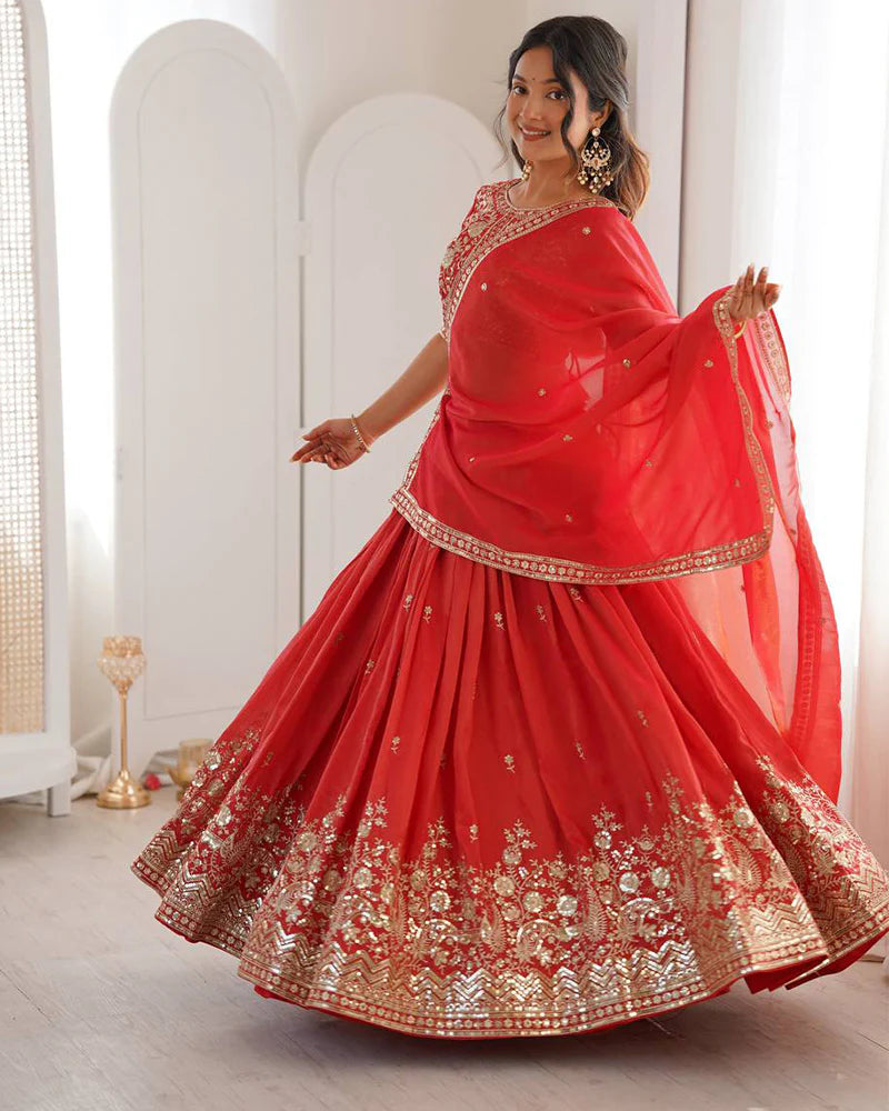 Womenline Orange Color Shimmer Silk Lehenga Choli