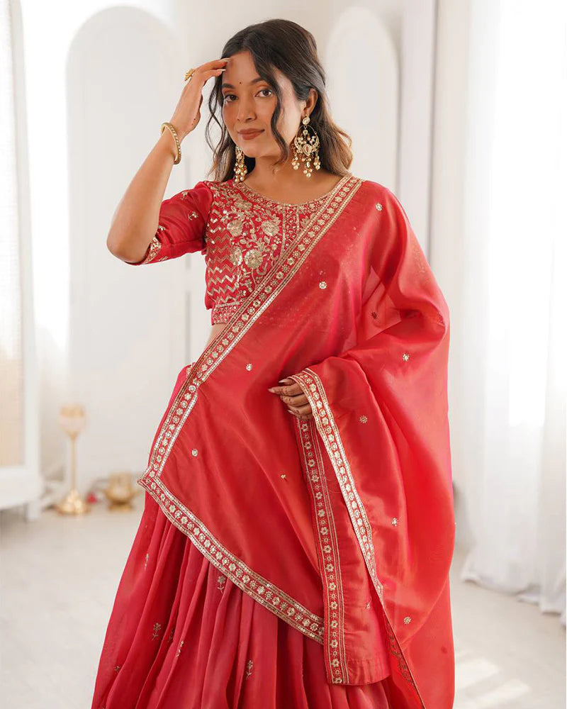 Womenline Orange Color Shimmer Silk Lehenga Choli