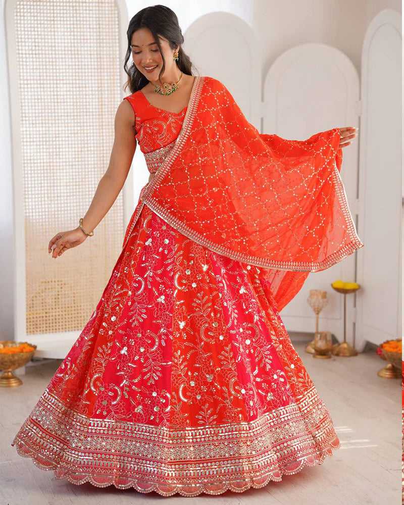 Womenline Orange Color Faux Georgette Embroidered Sequence Lehenga Choli