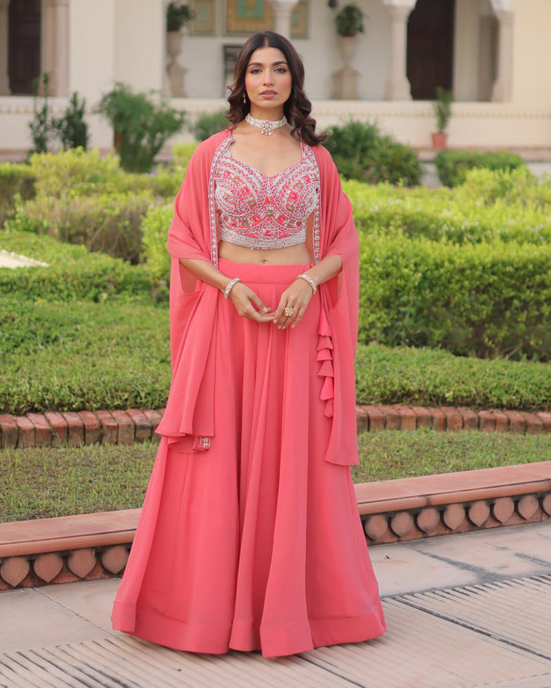 Womenline Peach Color Faux Georgette Embroidered Lehenga Choli