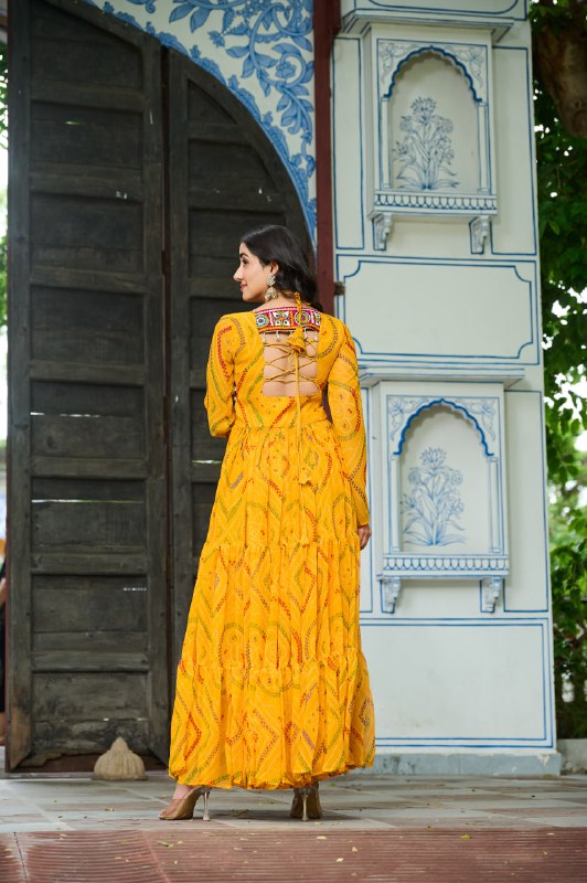 Womenline Festive Mustard Ethnic Gown With Colorful Mirror Work