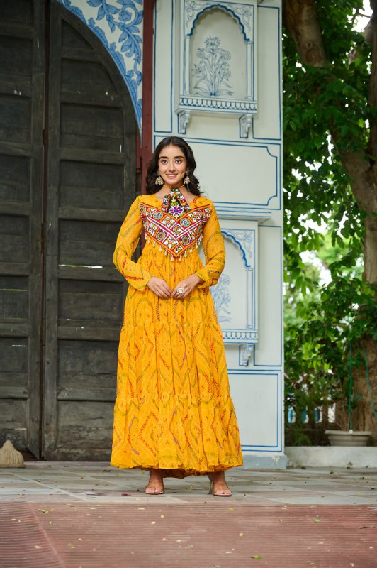 Womenline Festive Mustard Ethnic Gown With Colorful Mirror Work