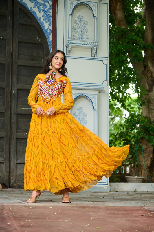 Womenline Festive Mustard Ethnic Gown With Colorful Mirror Work