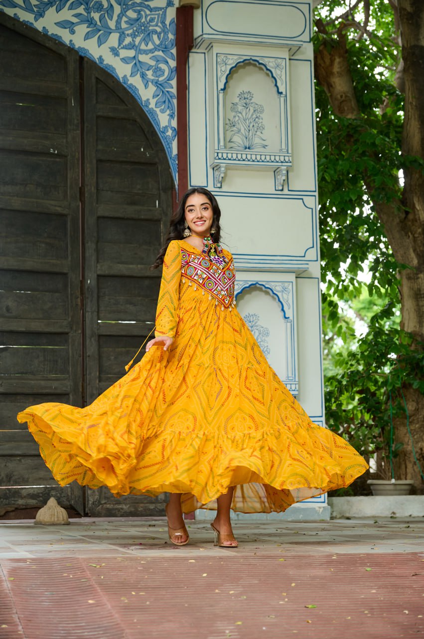 Womenline Festive Mustard Ethnic Gown With Colorful Mirror Work