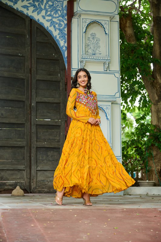 Womenline Festive Mustard Ethnic Gown With Colorful Mirror Work