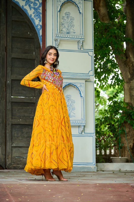 Womenline Festive Mustard Ethnic Gown With Colorful Mirror Work
