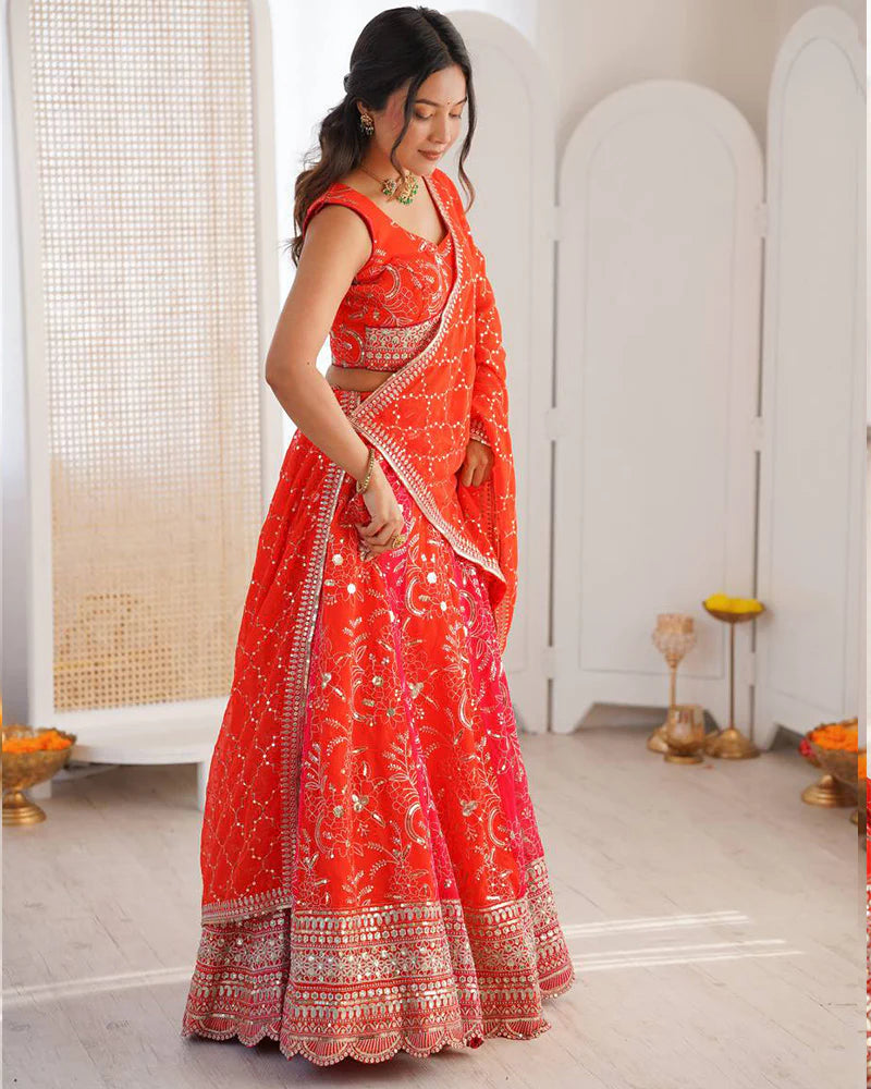 Womenline Orange Color Faux Georgette Embroidered Sequence Lehenga Choli