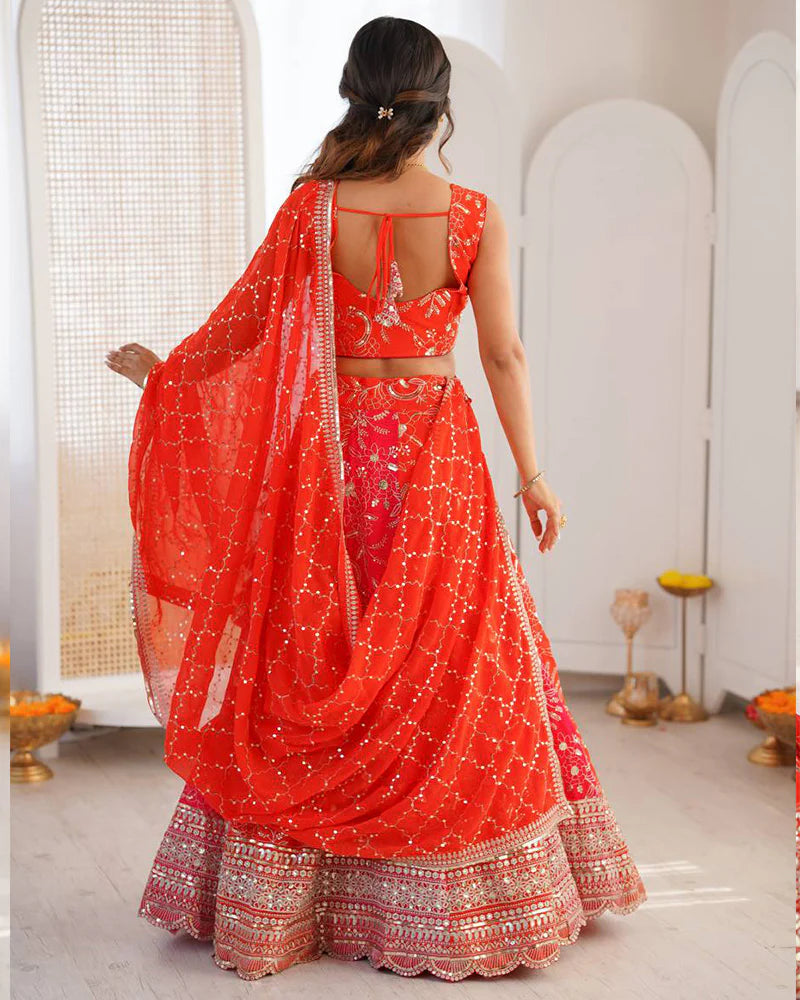 Womenline Orange Color Faux Georgette Embroidered Sequence Lehenga Choli