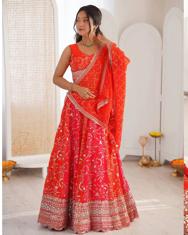 Womenline Orange Color Faux Georgette Embroidered Sequence Lehenga Choli