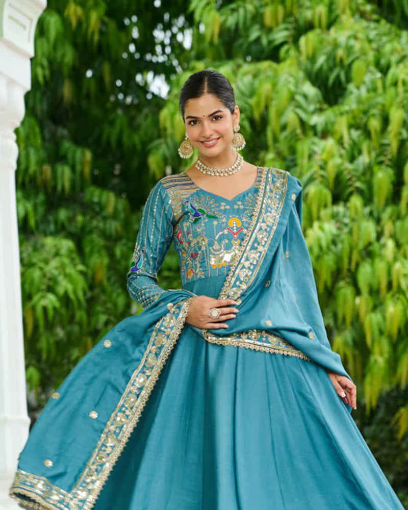 Womenline Teal Blue Color Vichitra Silk Sequence Embroidered Gown