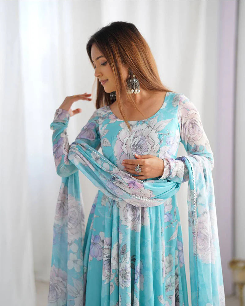 Womenline Sky Blue Color Georgette Floral Printed Gown