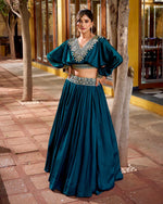 Womenline Peacock Blue Color Vichitra Silk Embroidered Lehenga Choli