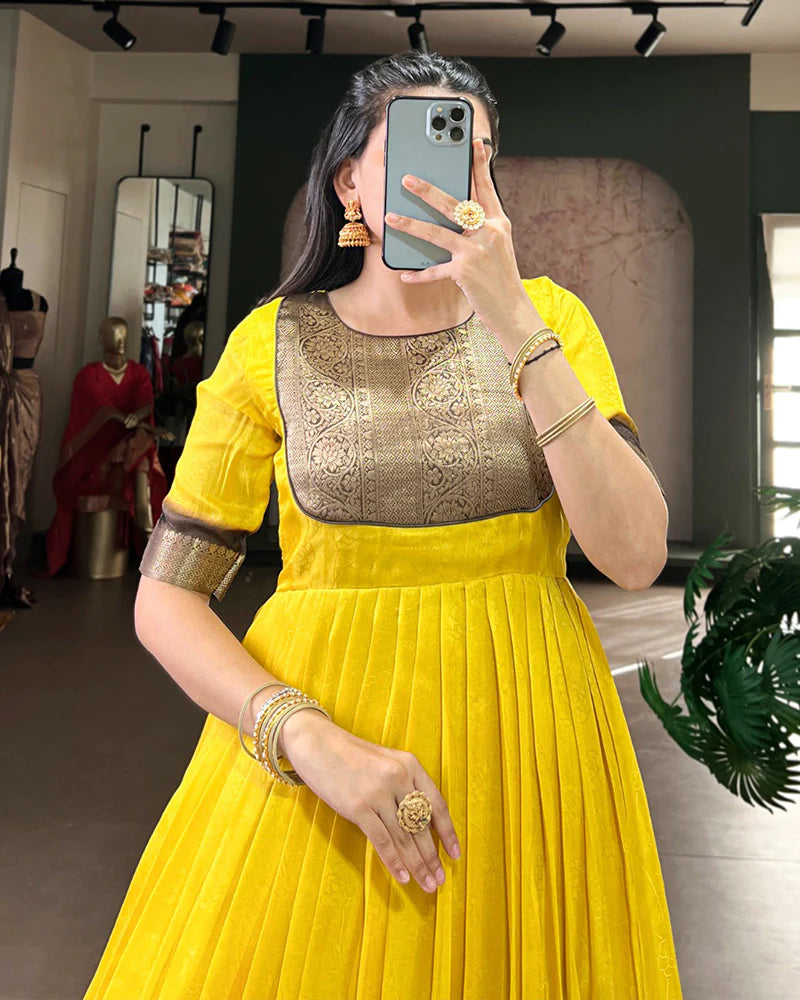 Womenline Yellow Color Mass Mello Zari Weaving Gown