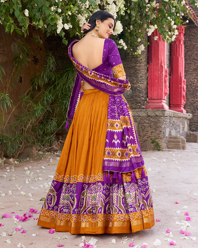 Womenline Designer Patola Printed Mustard Color Tussar Silk Lehenga Choli