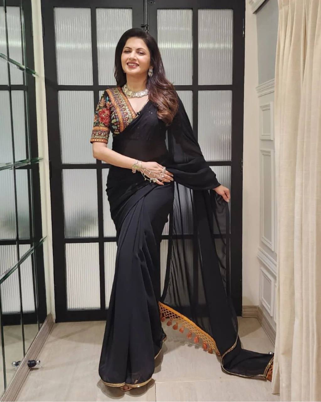WomenLine DESIGNER WEAR BLACK MAGIC FAUX GEORGETTE SAREE