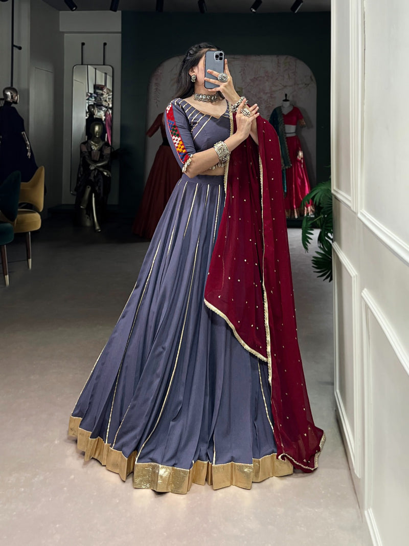 Womenline Onion Color Rayon Embossed Navratri Lehenga Choli