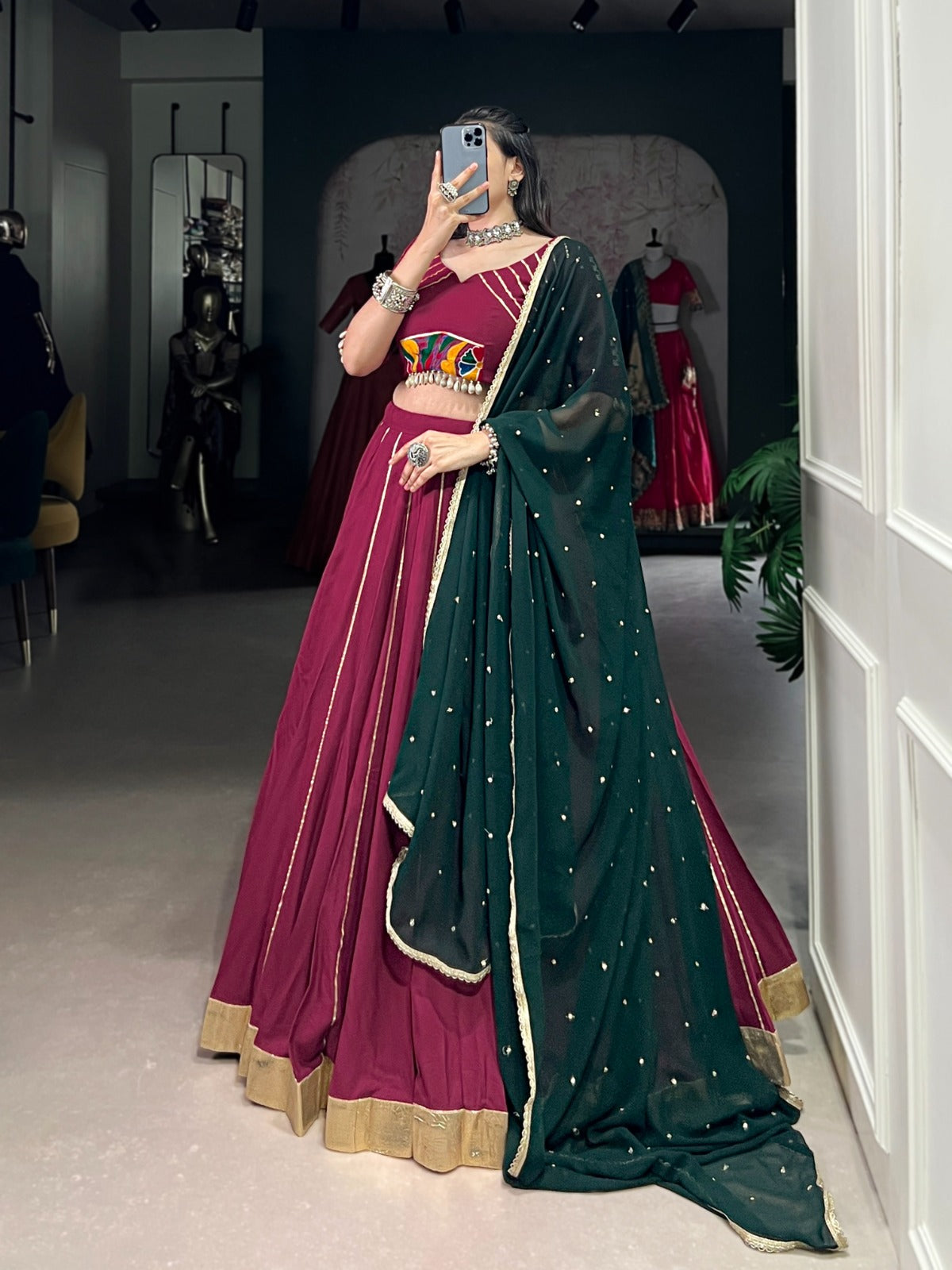 Womenline Plum Color Rayon Embossed Navratri Lehenga Choli