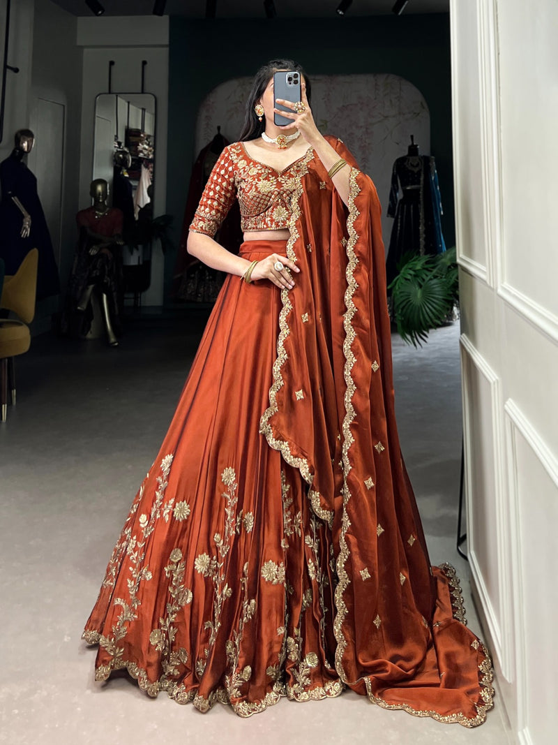 Womenline Rust Orange Color Rangoli Silk Embroidered Lehenga Choli