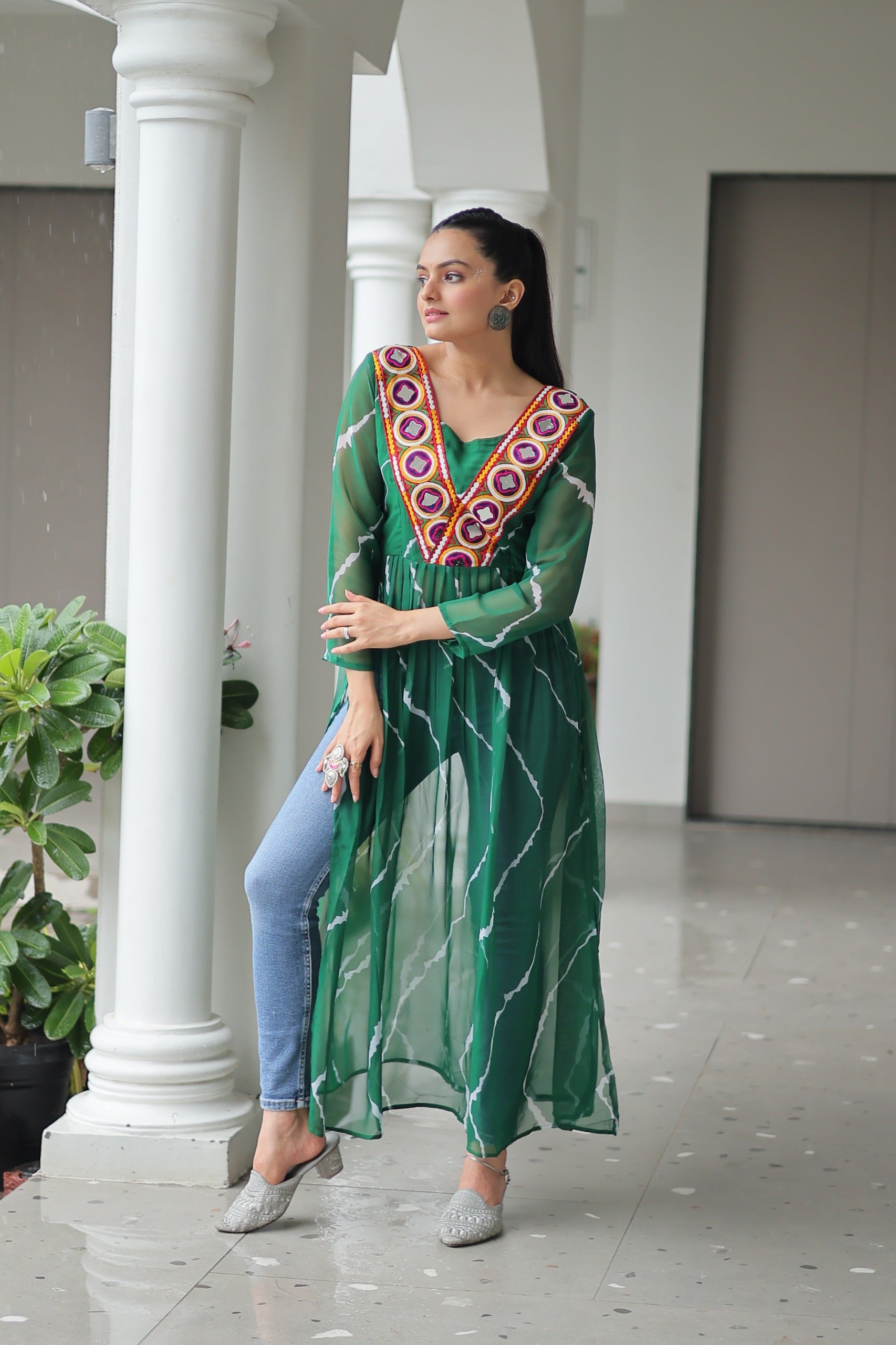 Womenline Green Color Faux Georgette Navratri Kurti