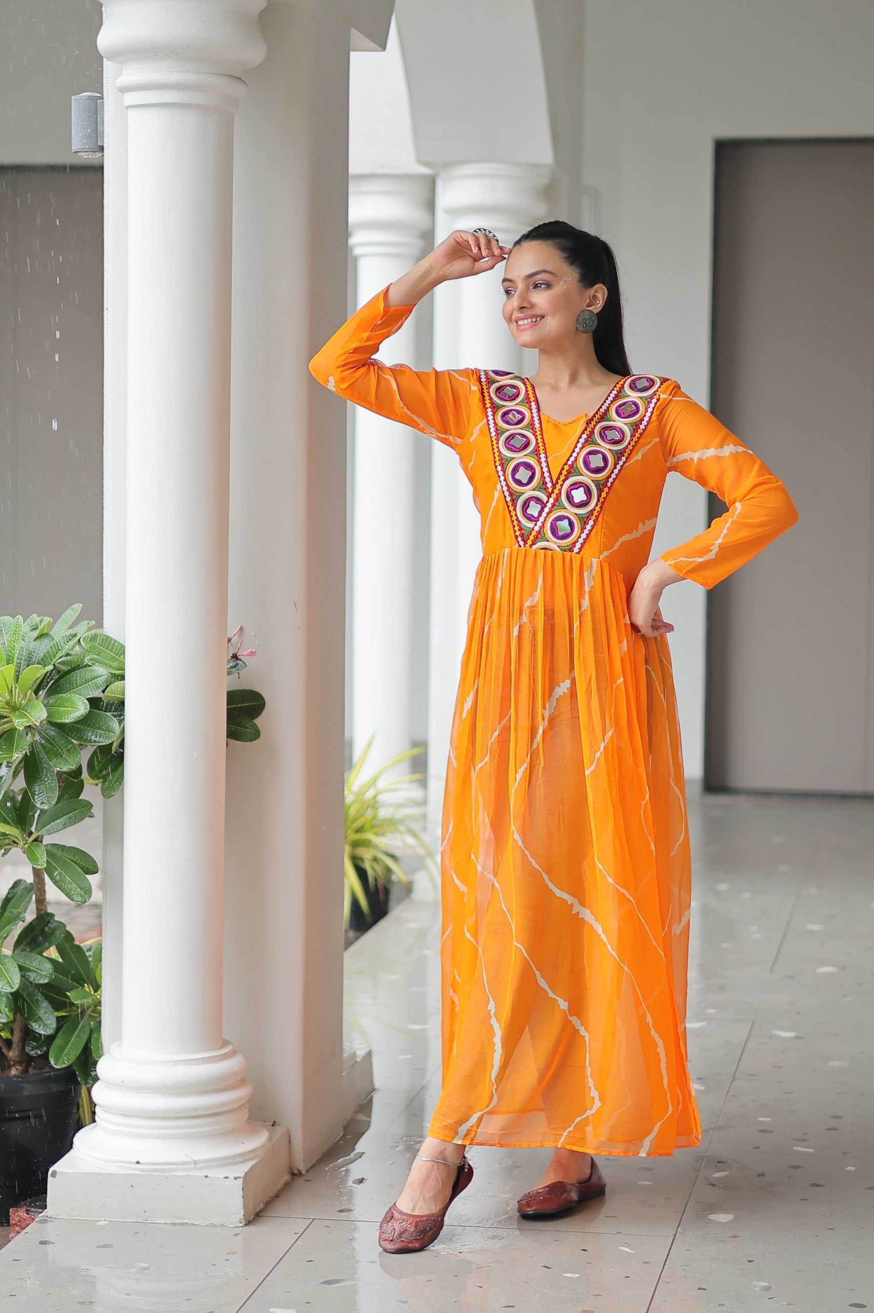 Womenline Yellow Color Faux Georgette Kurti