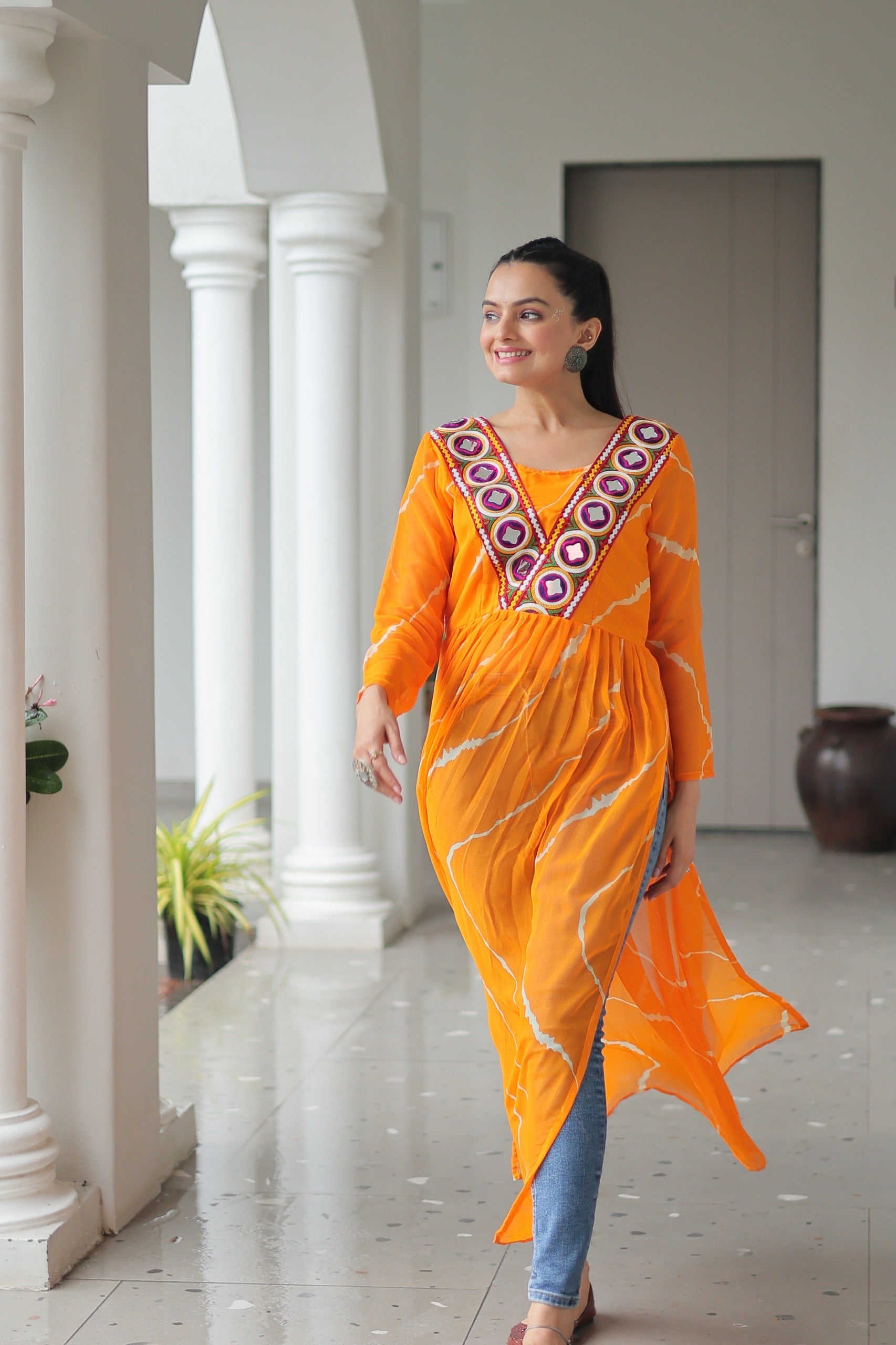 Womenline Yellow Color Faux Georgette Kurti