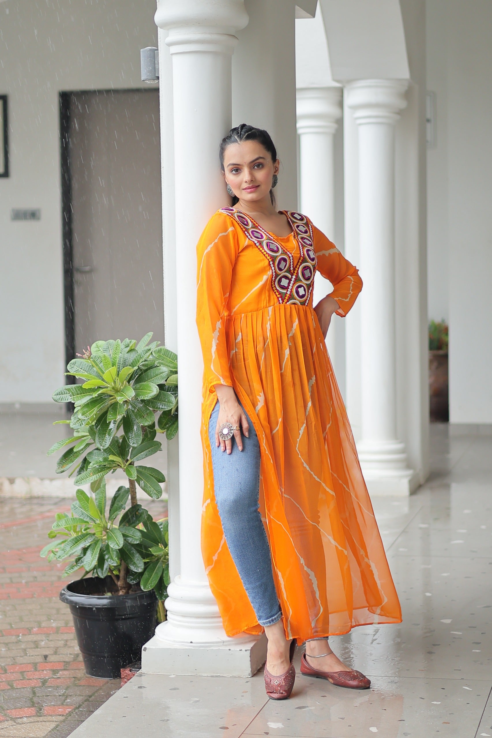 Womenline Yellow Color Faux Georgette Kurti