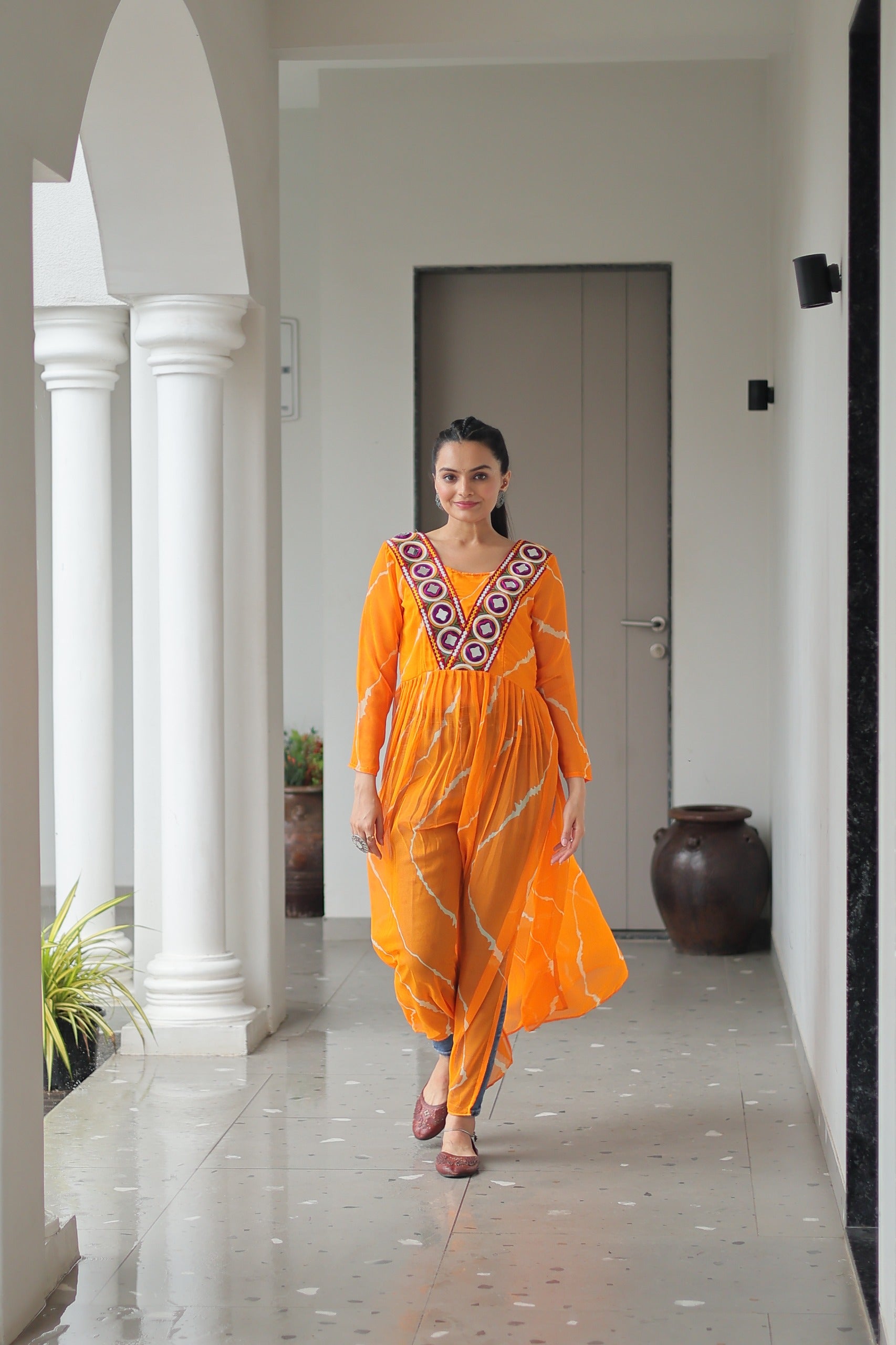 Womenline Yellow Color Faux Georgette Kurti