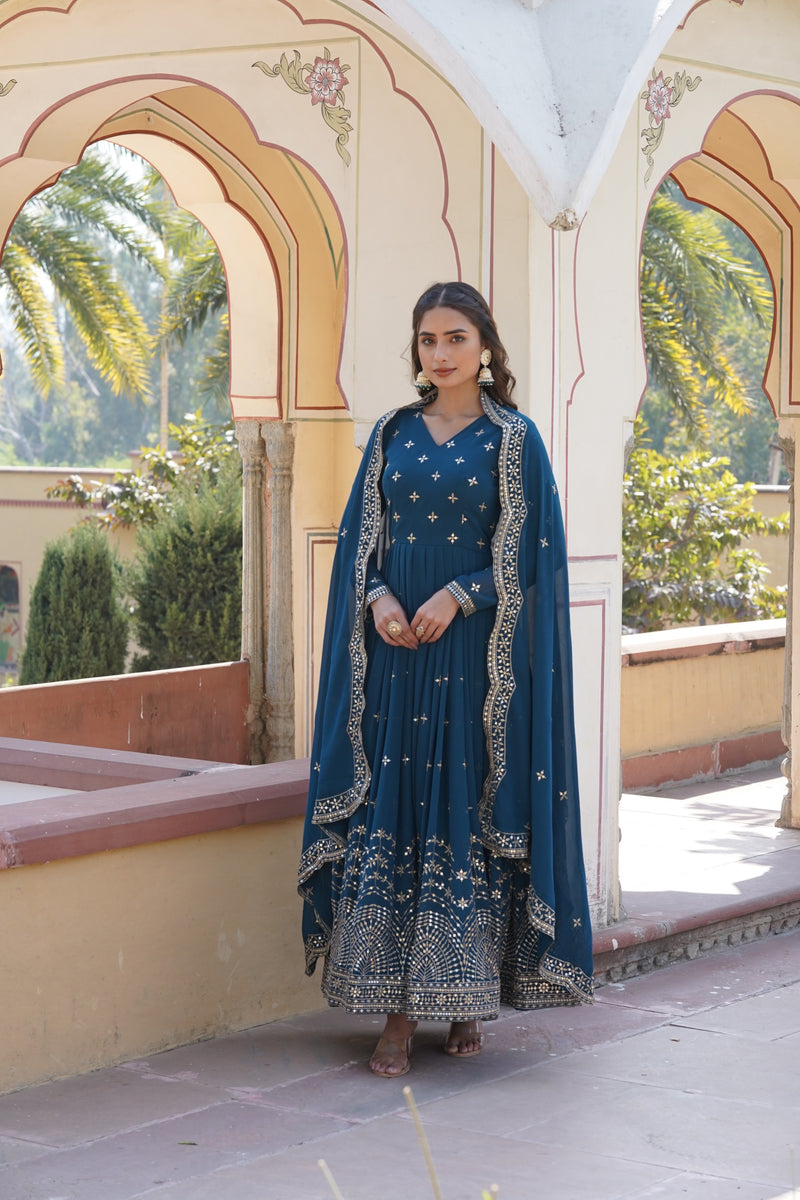 Womenline Rama Color Faux Georgette With Zari Gown