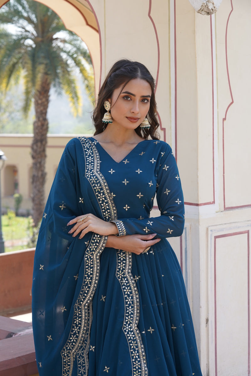 Womenline Rama Color Faux Georgette With Zari Gown