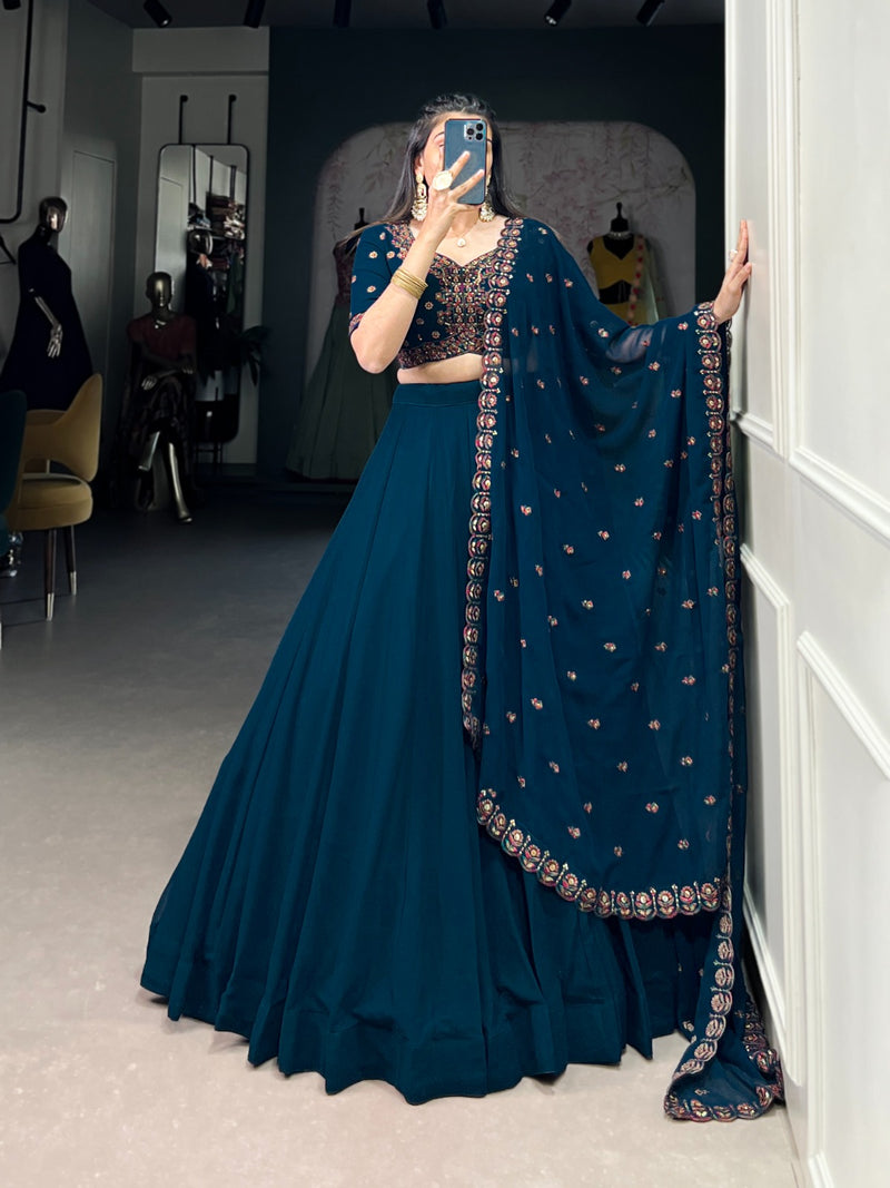 Womenline Firozi Color Georgette Embroidered Lehenga Choli