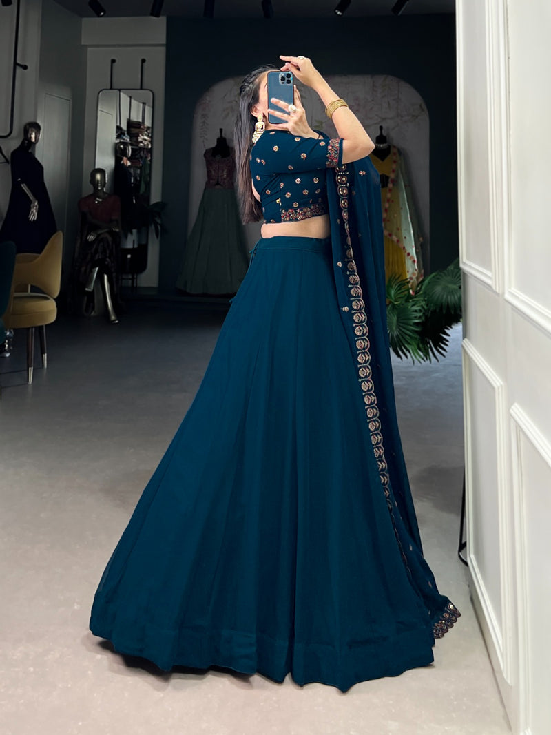 Womenline Firozi Color Georgette Embroidered Lehenga Choli