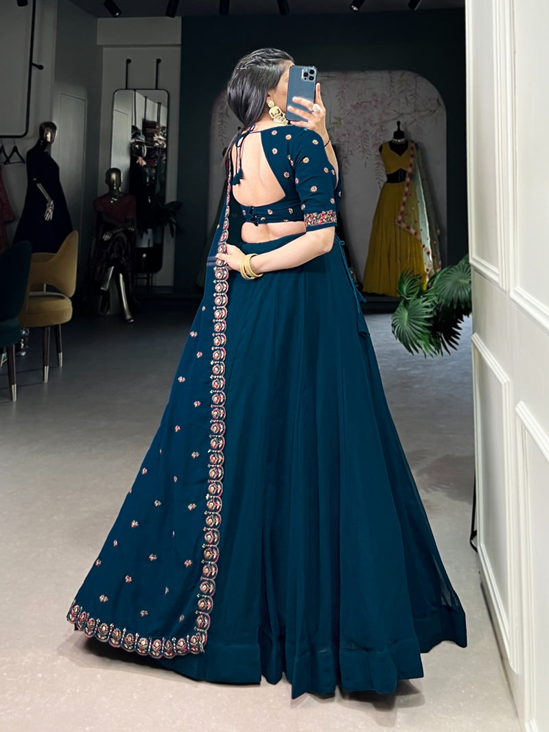 Womenline Firozi Color Georgette Embroidered Lehenga Choli