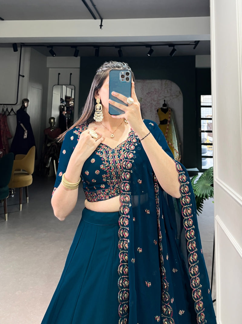 Womenline Firozi Color Georgette Embroidered Lehenga Choli