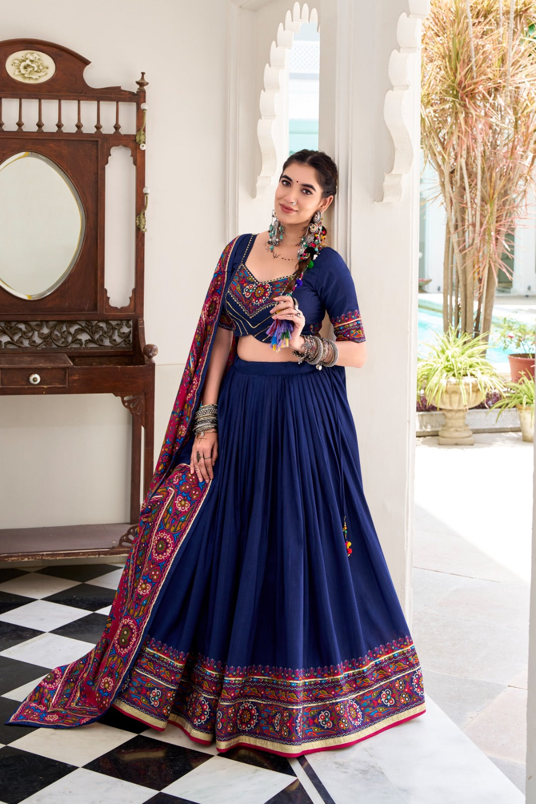 Womenline Navy Blue Color Tussar Silk Full Stitched Navratri Lehenga Choli