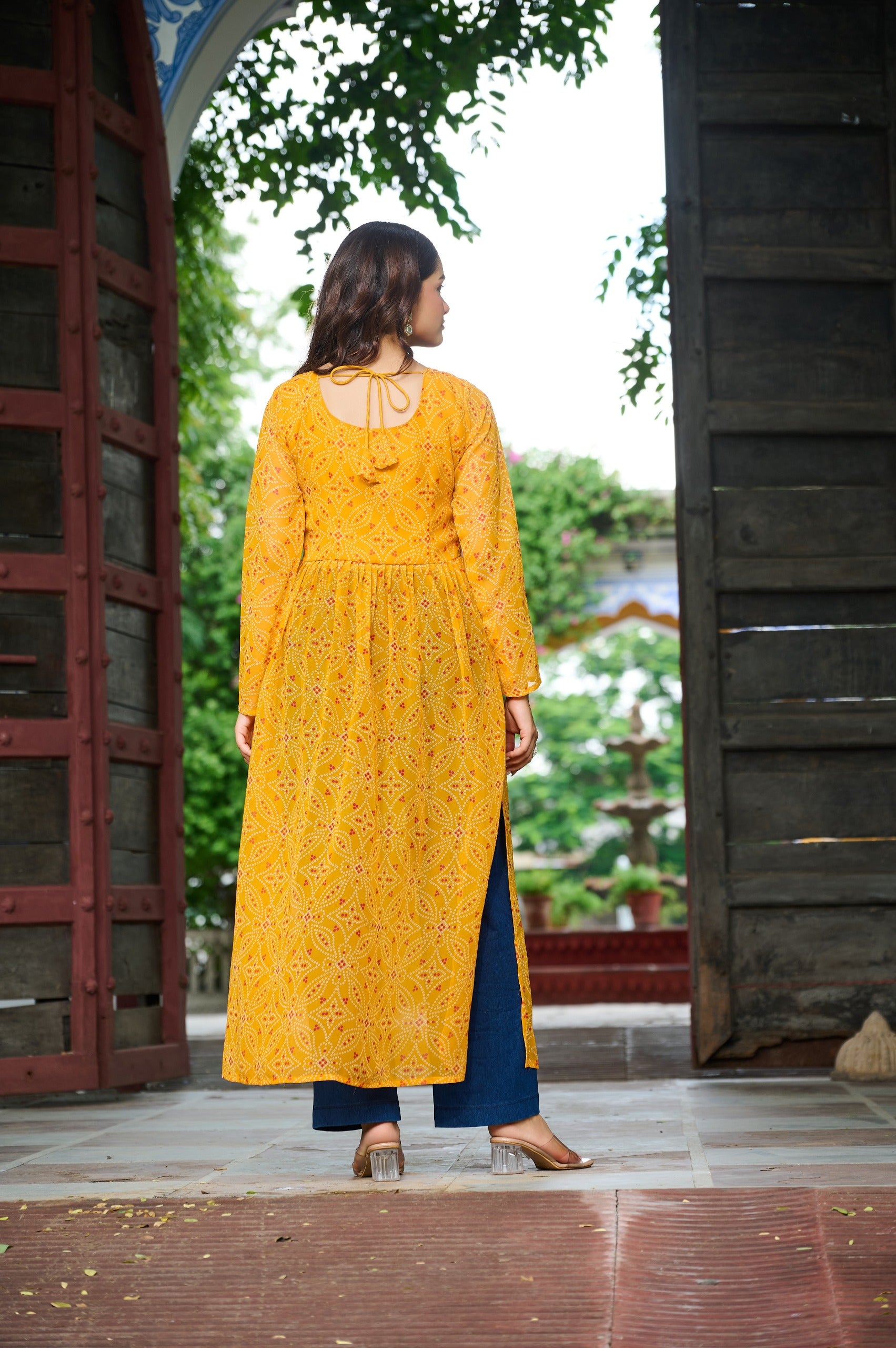 Womenline Festive Yellow Georgette Printed Kurti With Gamthi Patchwork