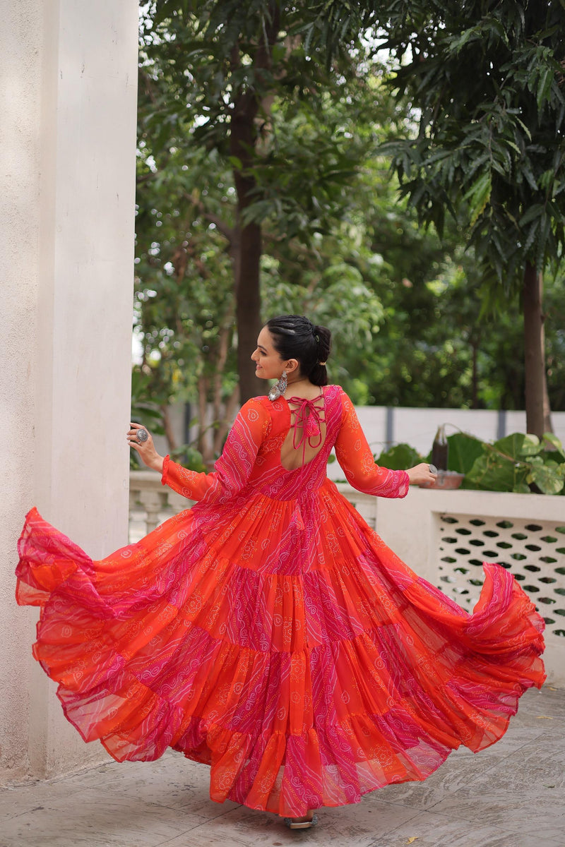 Womenline Orange Color Laheriya Faux Grorgette Navratri Gown