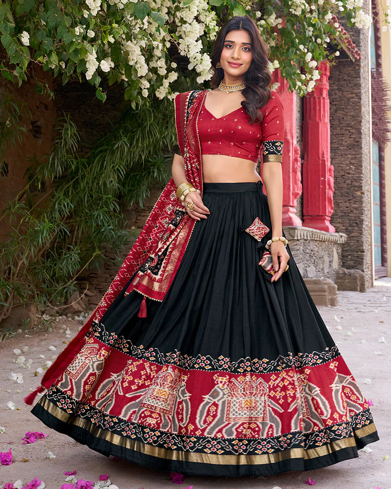 Womenline Designer Patola Printed Black Color Tussar Silk Lehenga Choli