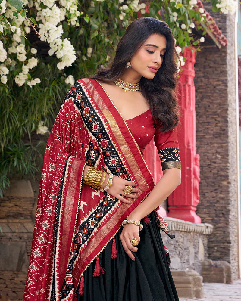 Womenline Designer Patola Printed Black Color Tussar Silk Lehenga Choli