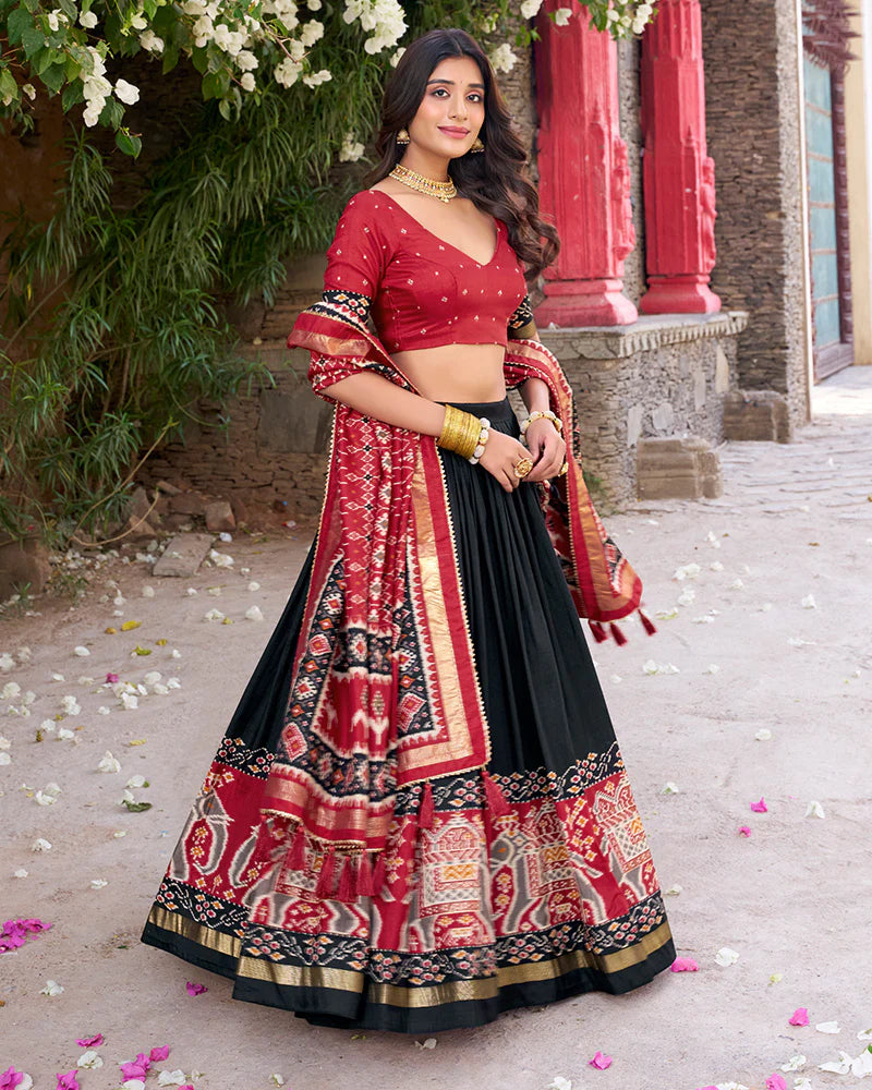 Womenline Designer Patola Printed Black Color Tussar Silk Lehenga Choli
