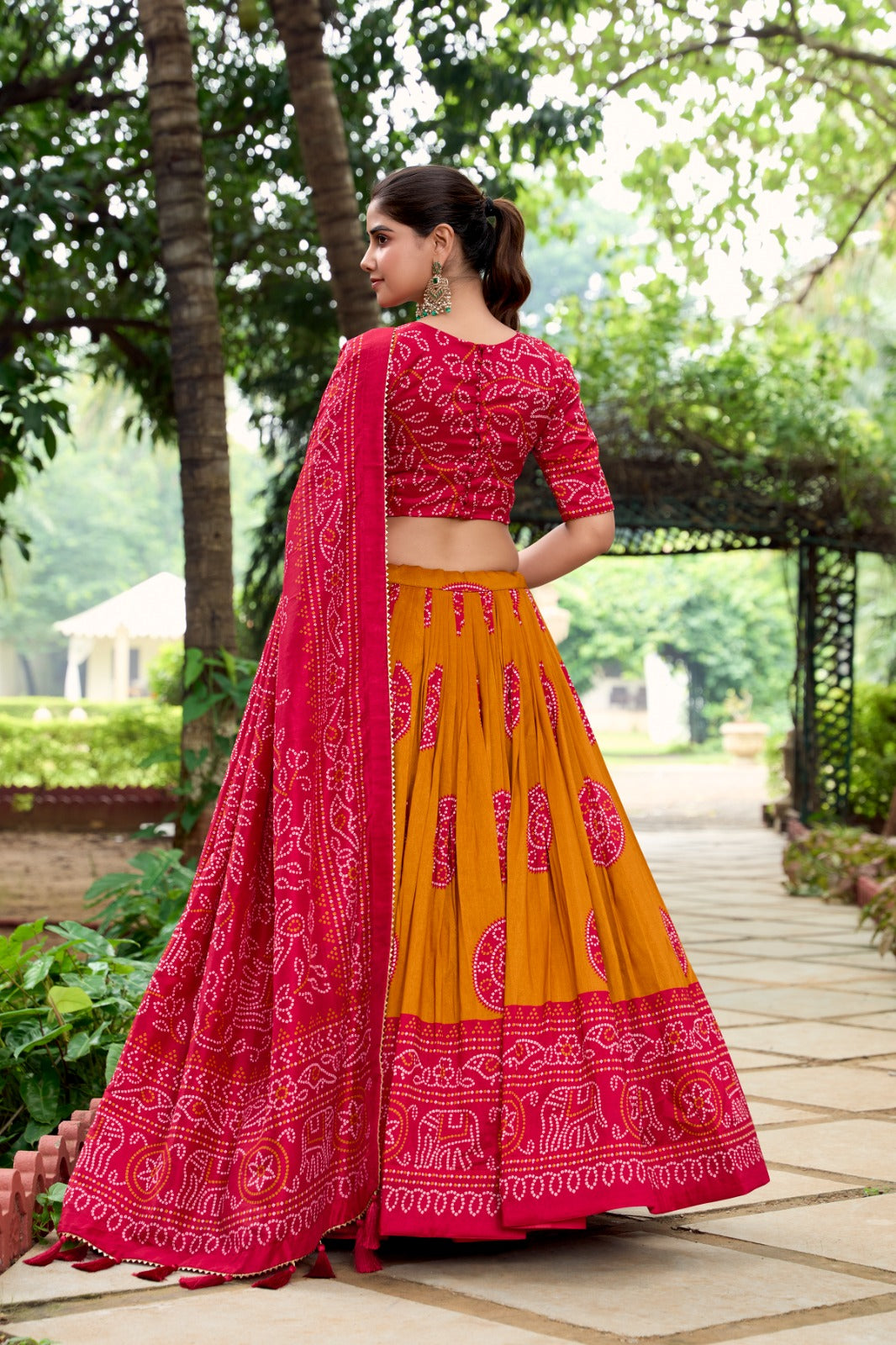 Womenline Mustard Color Tussar Silk Bandhej Printed Lehenga Choli