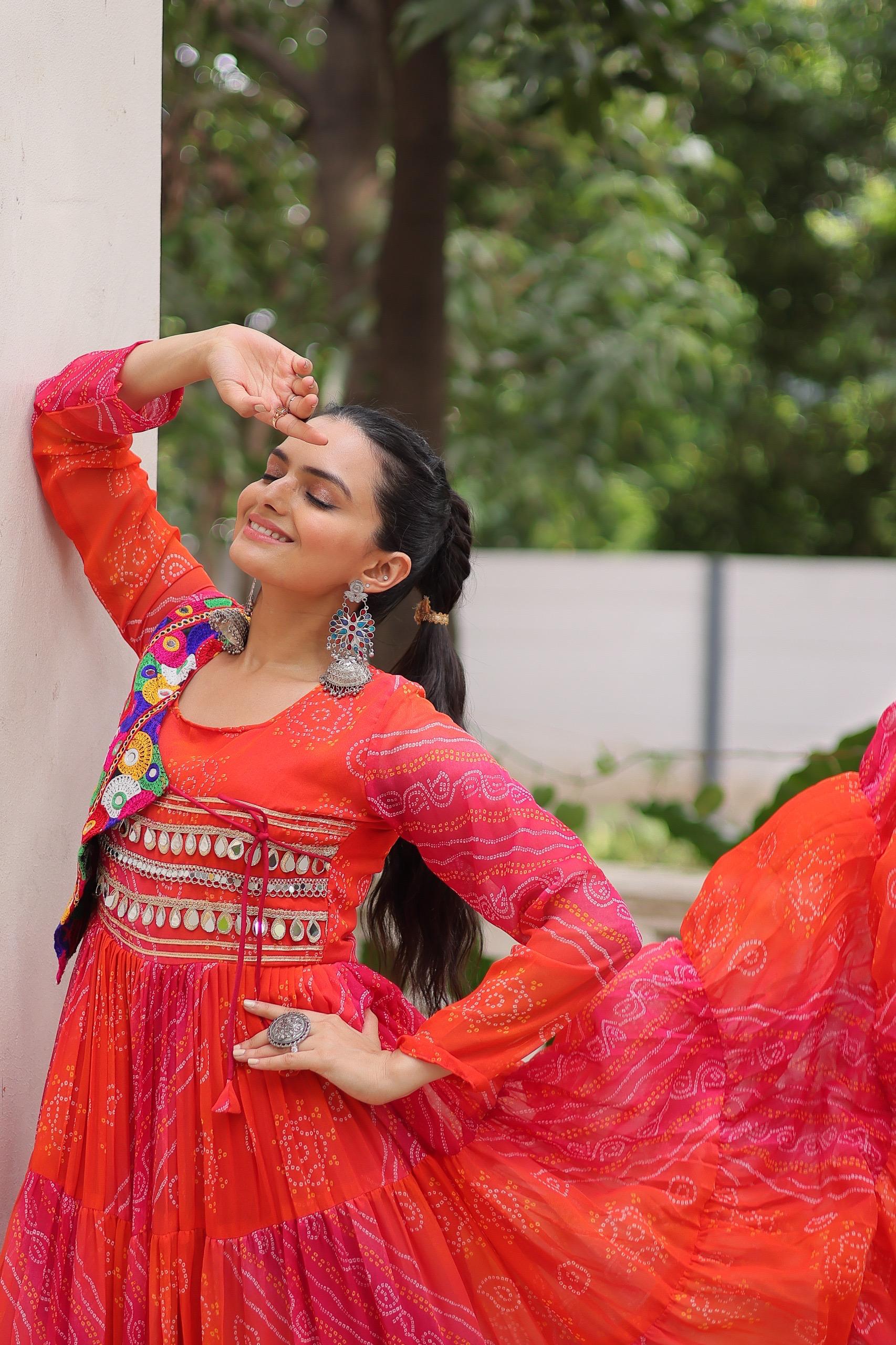 Womenline Orange Color Laheriya Faux Grorgette Navratri Gown