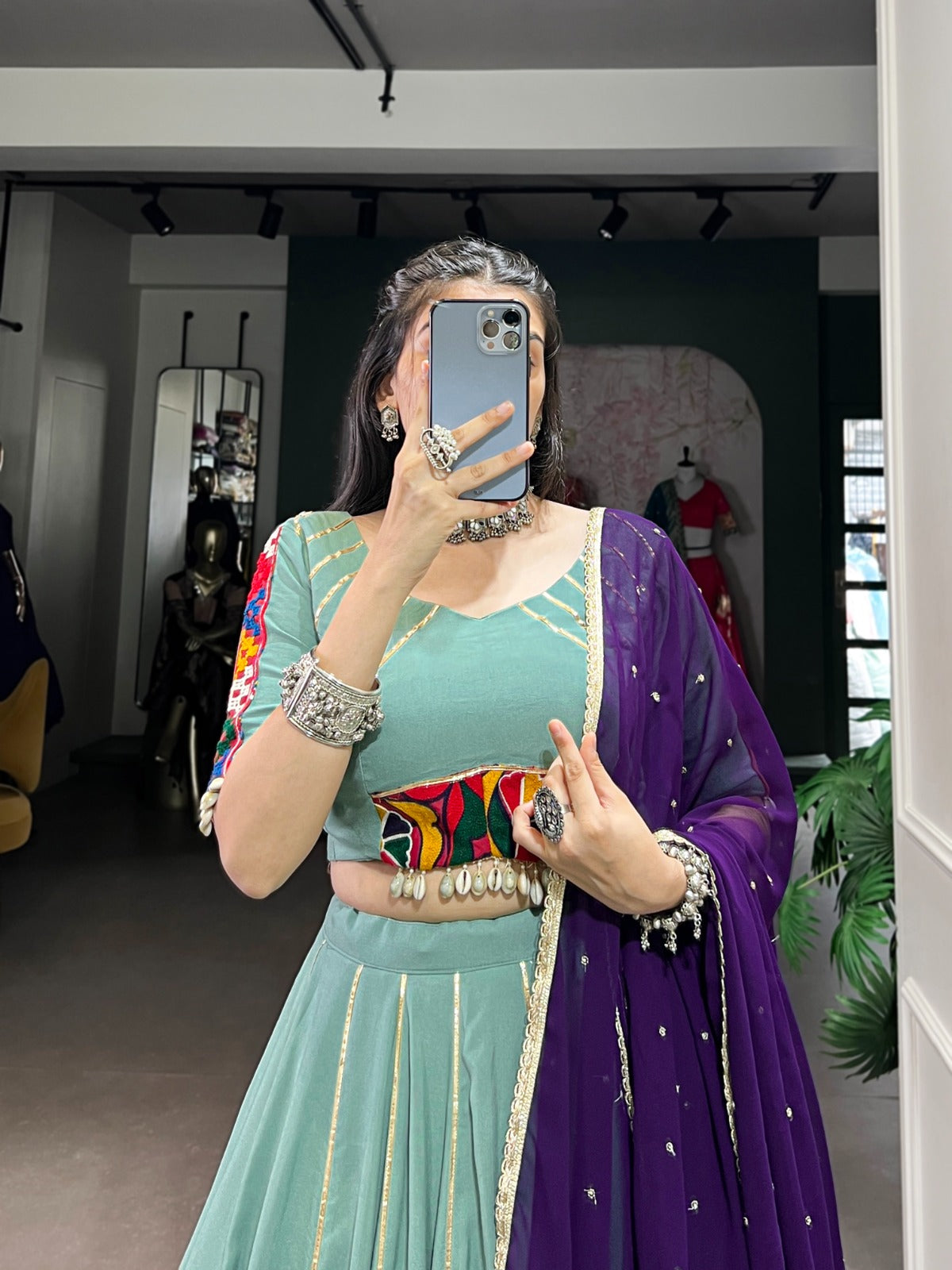 Womenline Sea Green Color Rayon Embossed Navratri Lehenga Choli