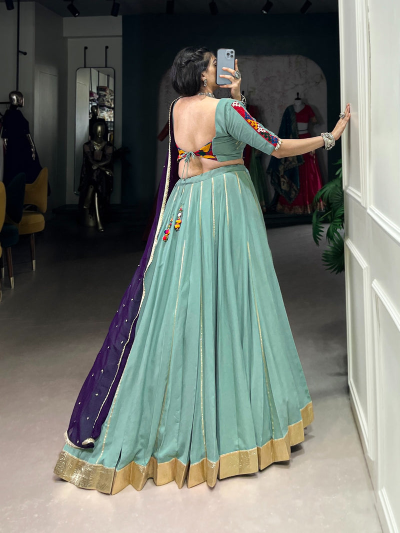 Womenline Sea Green Color Rayon Embossed Navratri Lehenga Choli