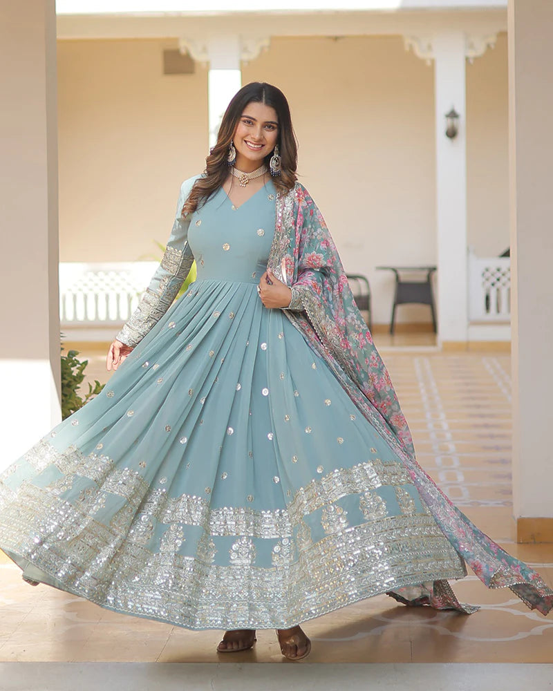 Womenline Sky Color Faux Georgette Designer Gown With Dupatta