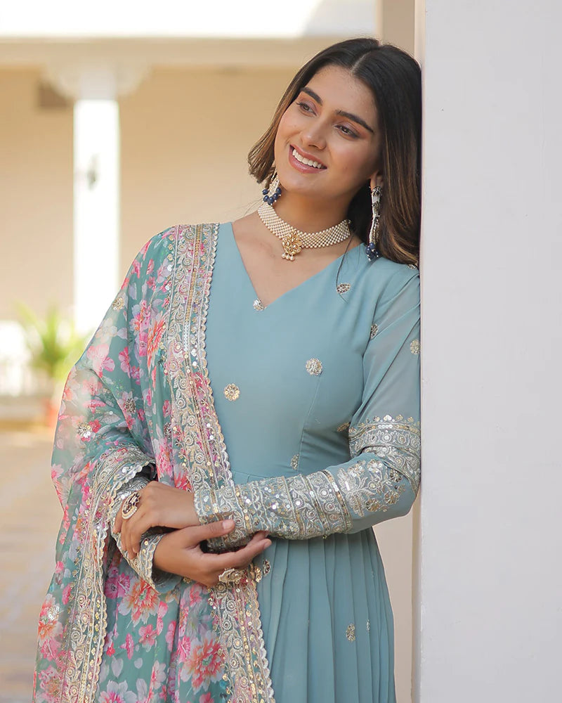 Womenline Sky Color Faux Georgette Designer Gown With Dupatta