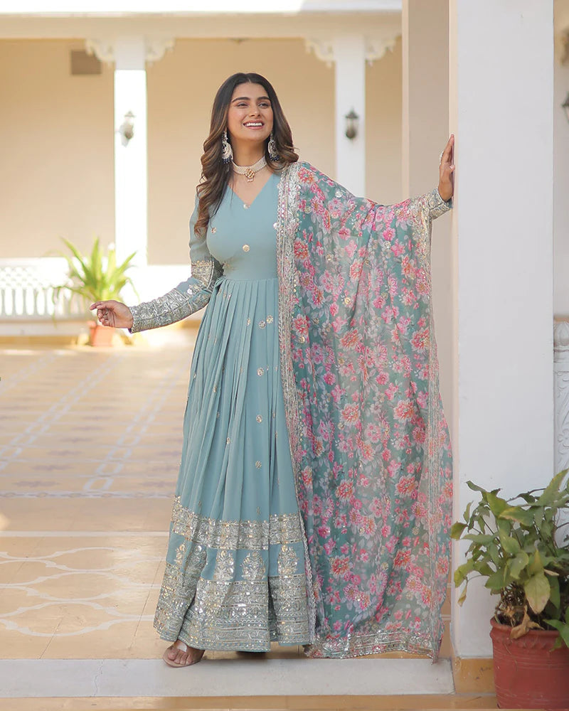 Womenline Sky Color Faux Georgette Designer Gown With Dupatta