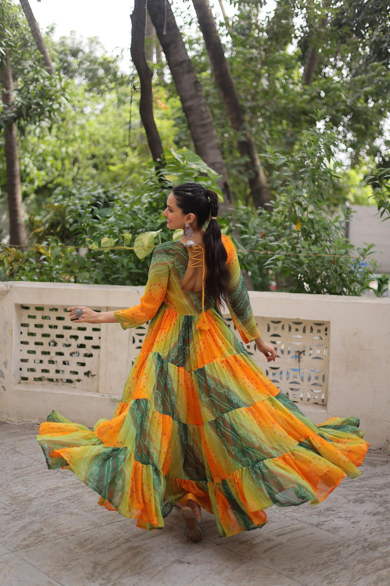 Womenline Yellow Color Laheriya Faux Georgette Gown
