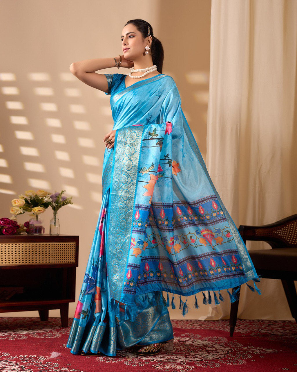 Womneline Sky Blue Floral Designer Saree with Elegant Woven Border & Artistic Pallu