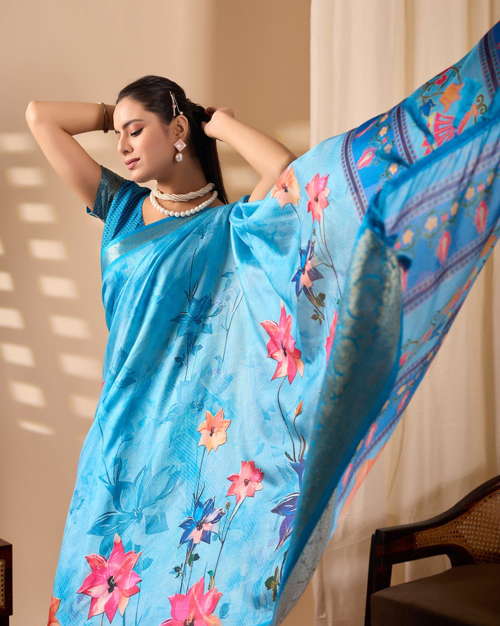 Womneline Sky Blue Floral Designer Saree with Elegant Woven Border & Artistic Pallu